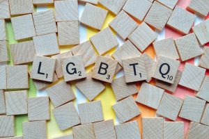 A picture of Scrabble pieces that spell out LGBTQ